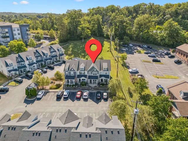 a view of swimming pool with a patio