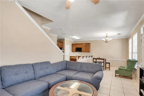 a living room with furniture and a couch