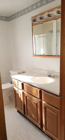 a view of a sink and a mirror