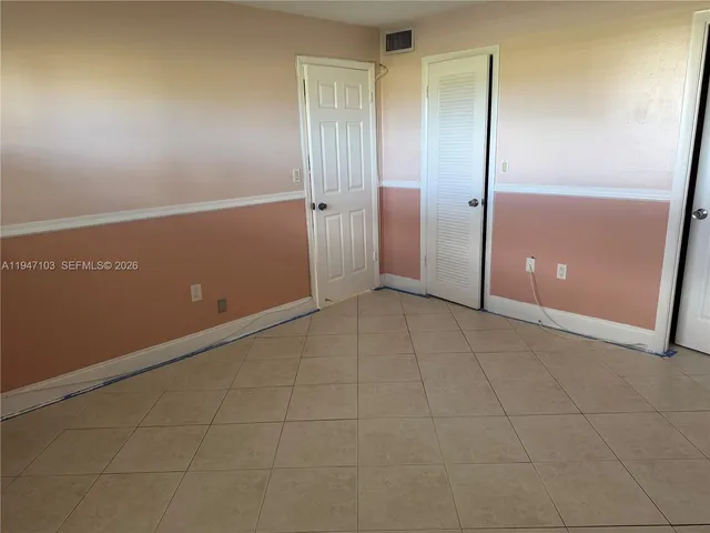 a view of a livingroom with wooden floor