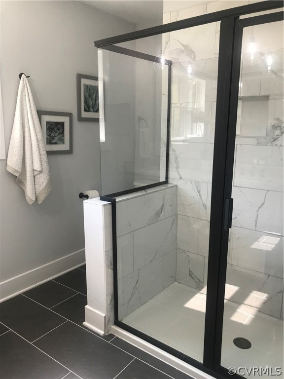 1793 Maidens Road Maidens, VA 23102 - Photo 21 of 40 a bathroom with a glass shower door
