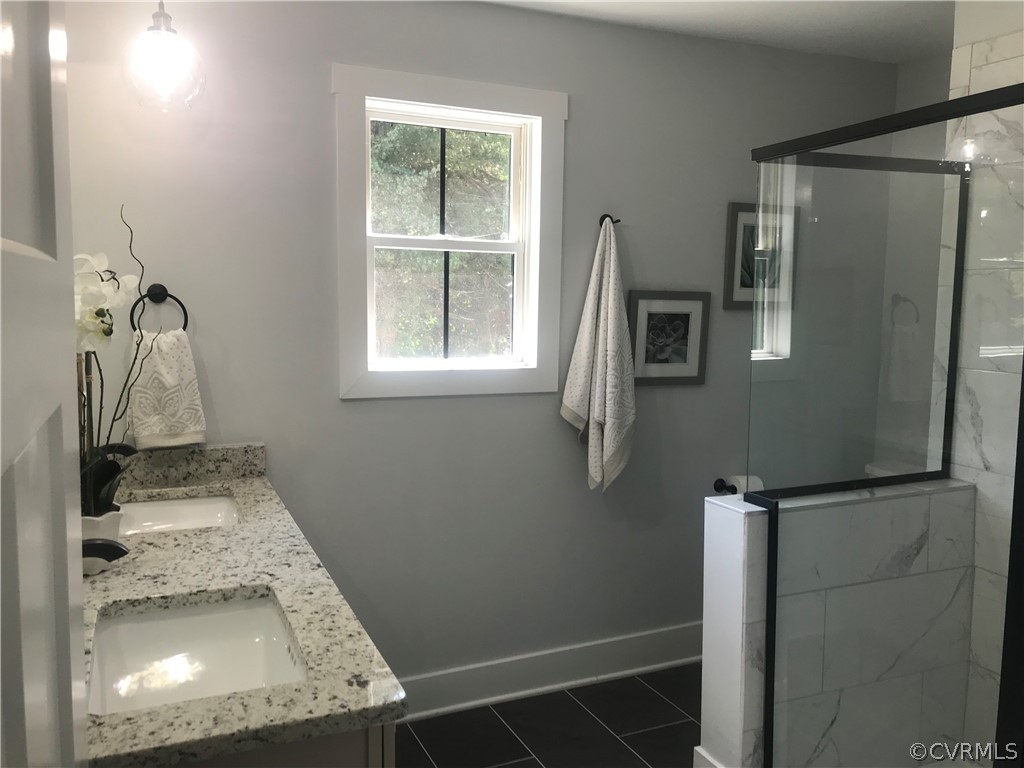 1793 Maidens Road Maidens, VA 23102 - Photo 22 of 40 a bathroom with a sink and a mirror