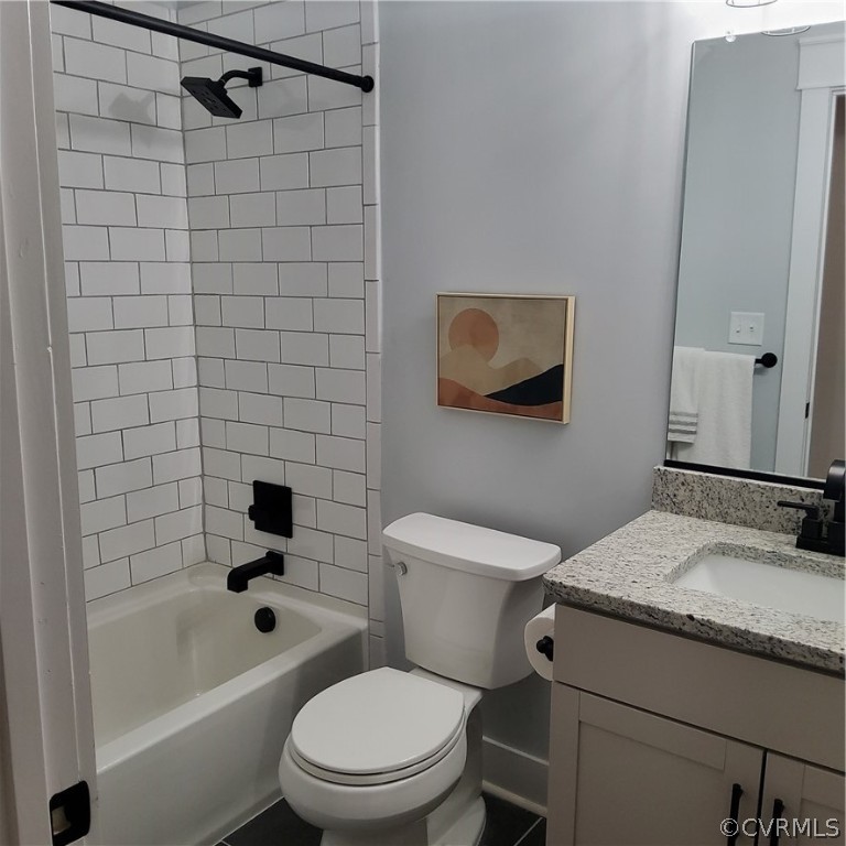 1793 Maidens Road Maidens, VA 23102 - Photo 30 of 40 a bathroom with a granite countertop toilet a sink and shower
