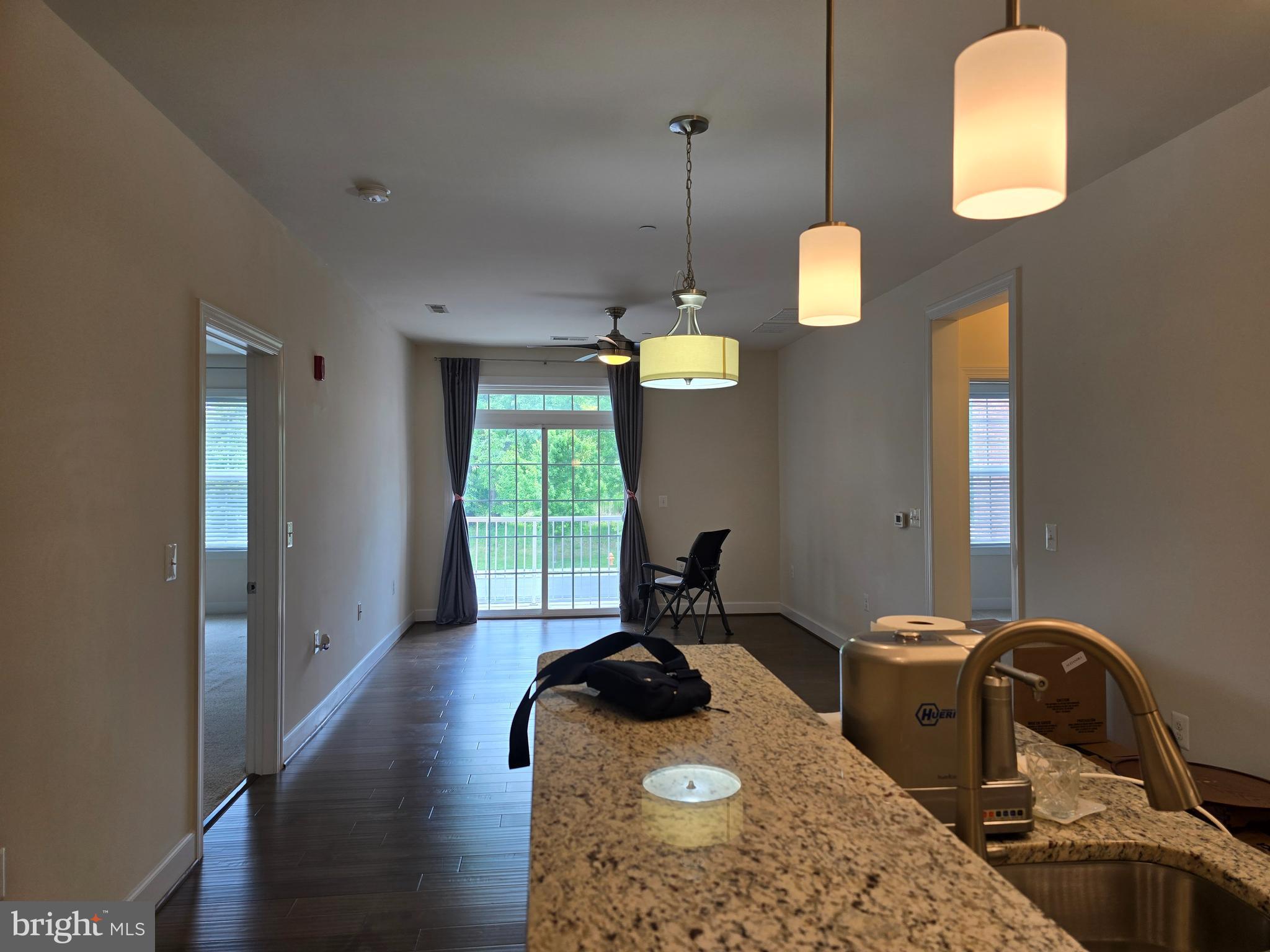 10530 Resort Road, Unit 101 Ellicott City, MD 21042 - Photo 5 of 13 a room with furniture and a window