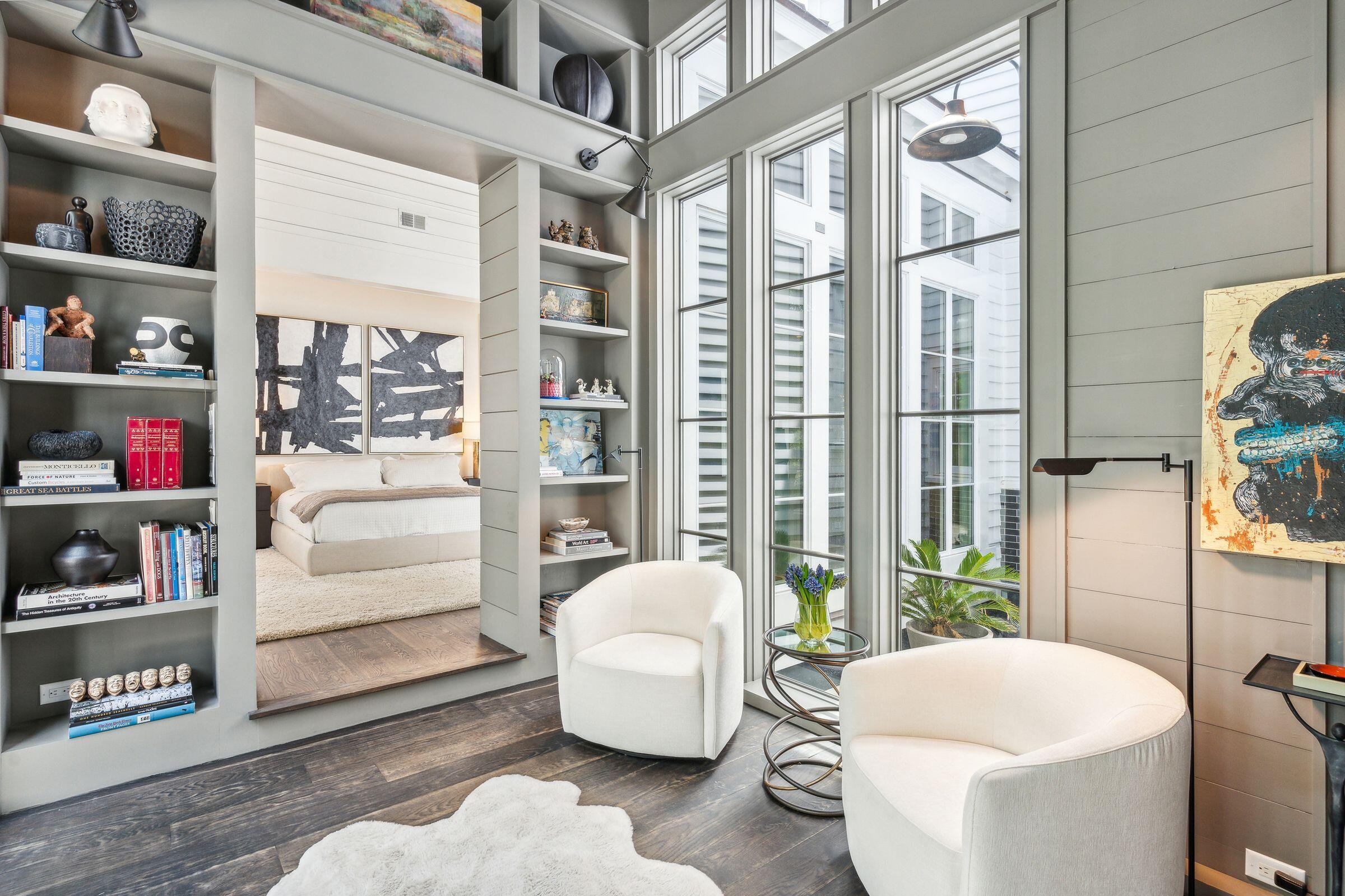 47 Robert Mills Circle Mount Pleasant, SC 29464 - Photo 28 of 98 Floor to ceiling glass adds drama