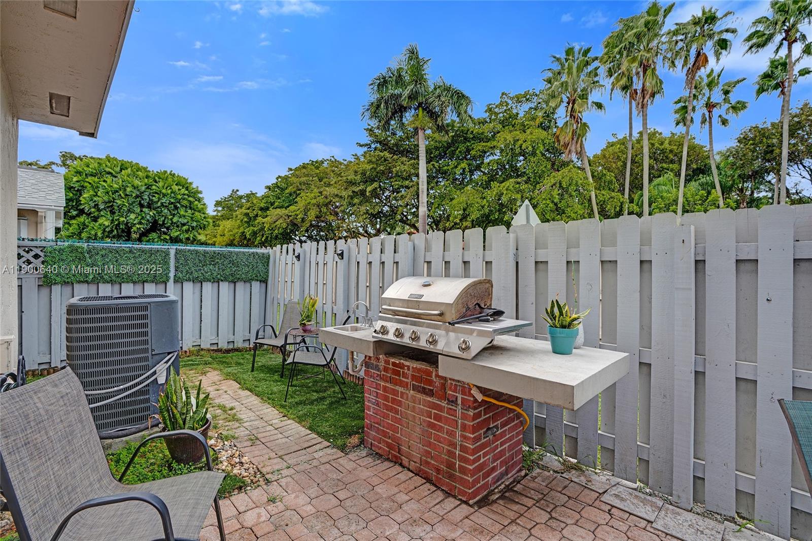 12221 Southwest 144th Terrace Miami, FL 33186 - Photo 32 of 42 a view of a deck with furniture