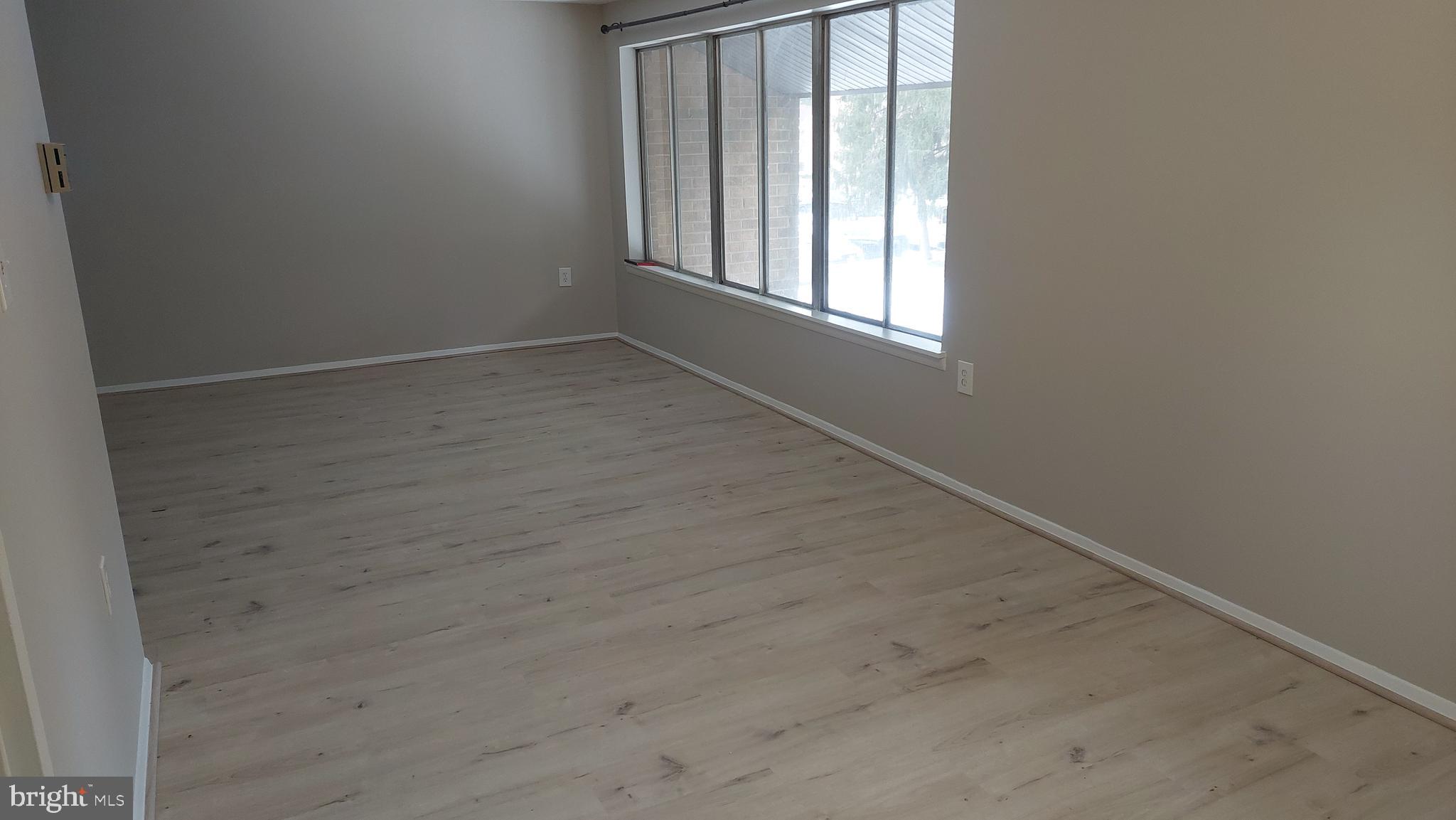 18622 Walkers Choice Road, Unit 6 Montgomery Village, MD 20886 - Photo 14 of 37 Dining Rm 3/ Living Rm 9