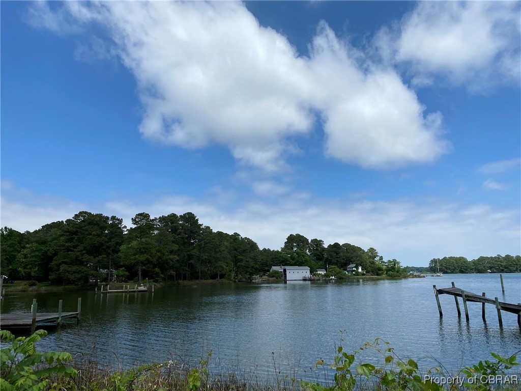 335 Hicks Road Hudgins, VA 23076 - Photo 21 of 21 a view of a lake with outdoor space