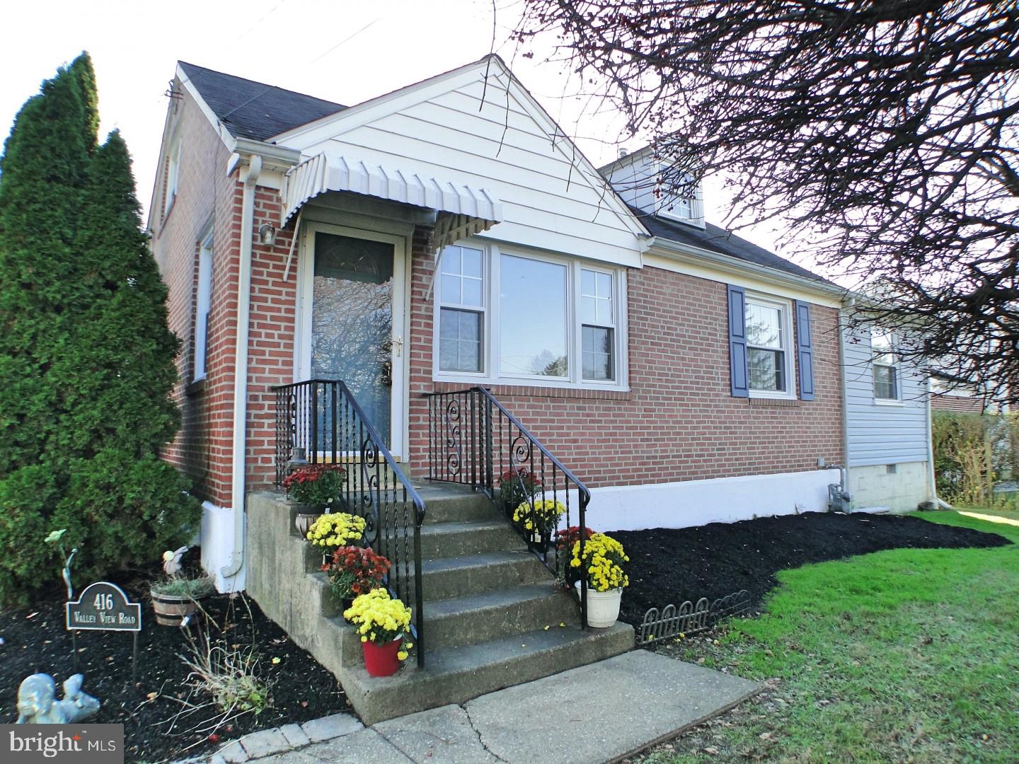 416 Valley View Road Springfield, PA 19064 - Photo 1 of 40 a front view of a house with outdoor seating