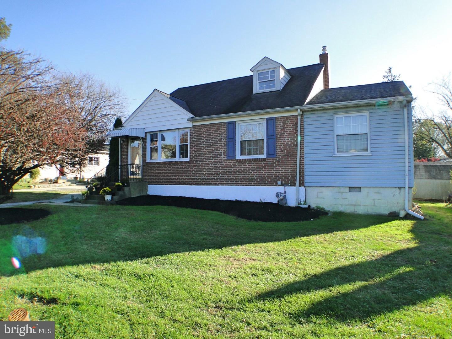 416 Valley View Road Springfield, PA 19064 - Photo 3 of 40 a front view of a house with a yard
