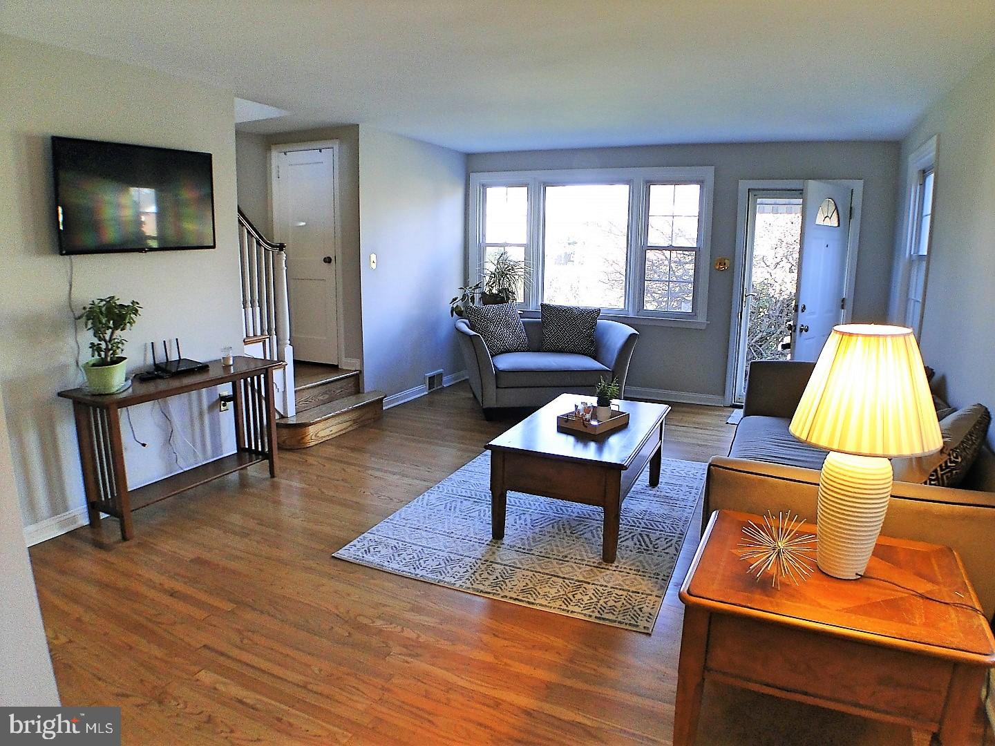 416 Valley View Road Springfield, PA 19064 - Photo 4 of 40 a living room with furniture and a flat screen tv