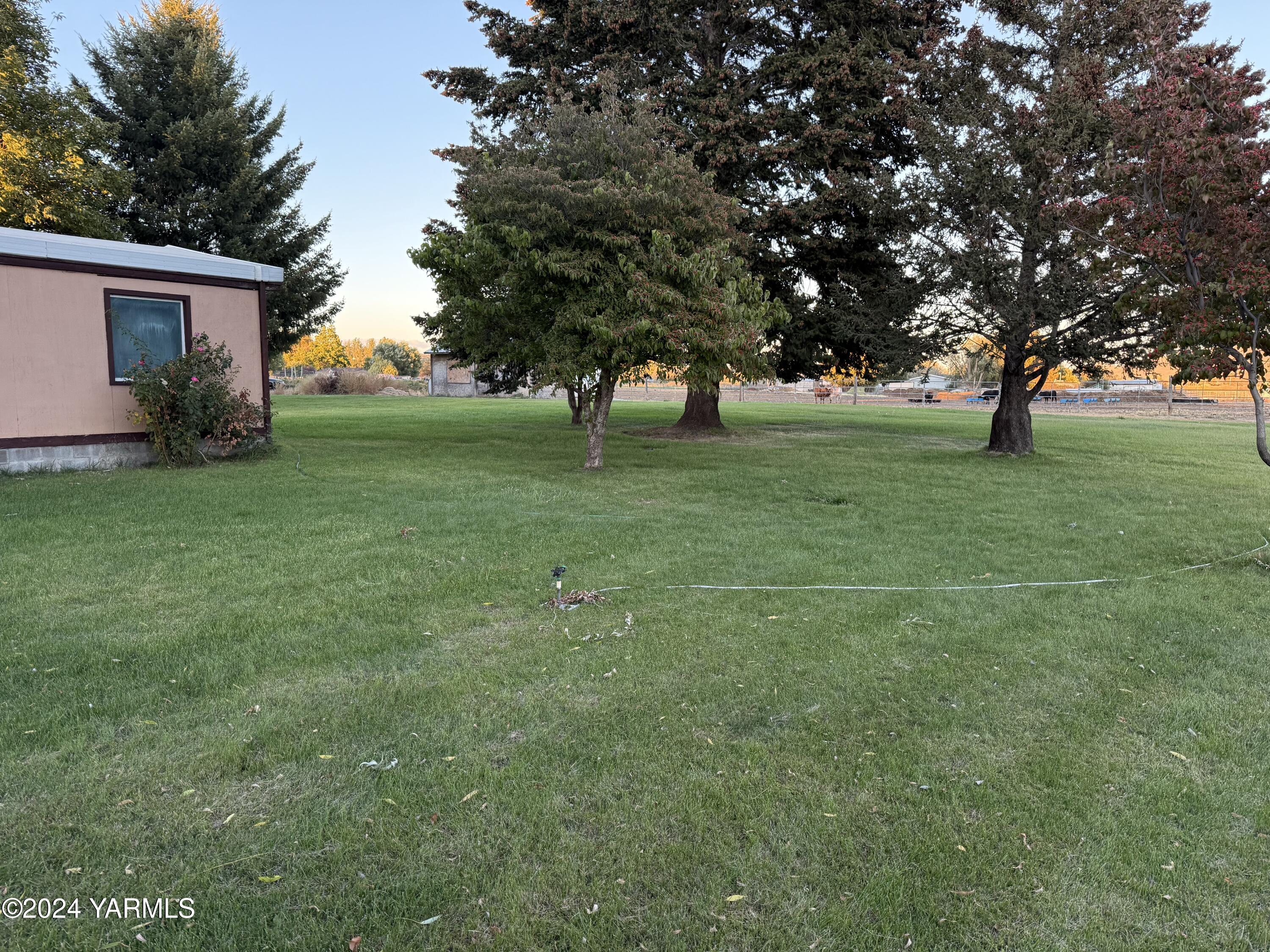 19101 North Beers Road Prosser, WA 99350 - Photo 14 of 45 a view of outdoor space with deck and tree