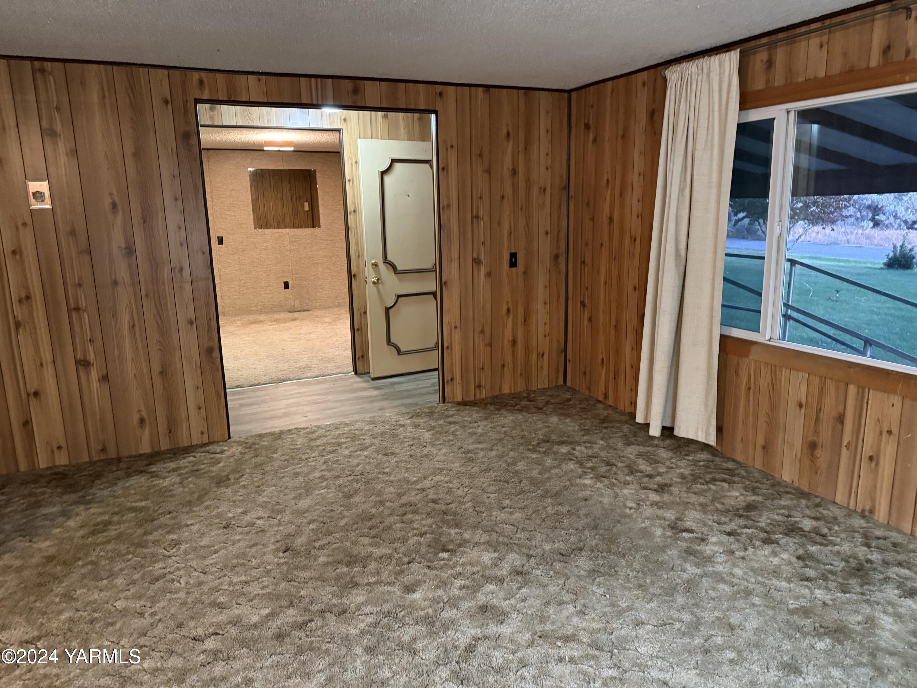 19101 North Beers Road Prosser, WA 99350 - Photo 16 of 45 a view of empty room with wooden door