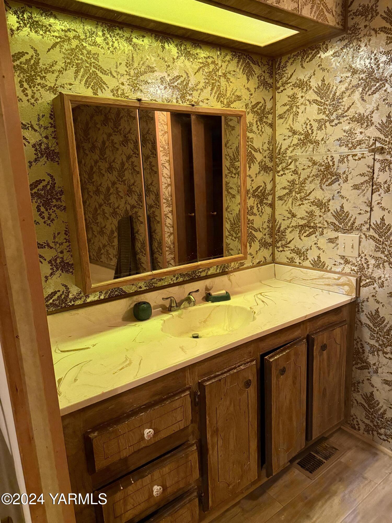 19101 North Beers Road Prosser, WA 99350 - Photo 21 of 45 a bathroom with a sink and a mirror