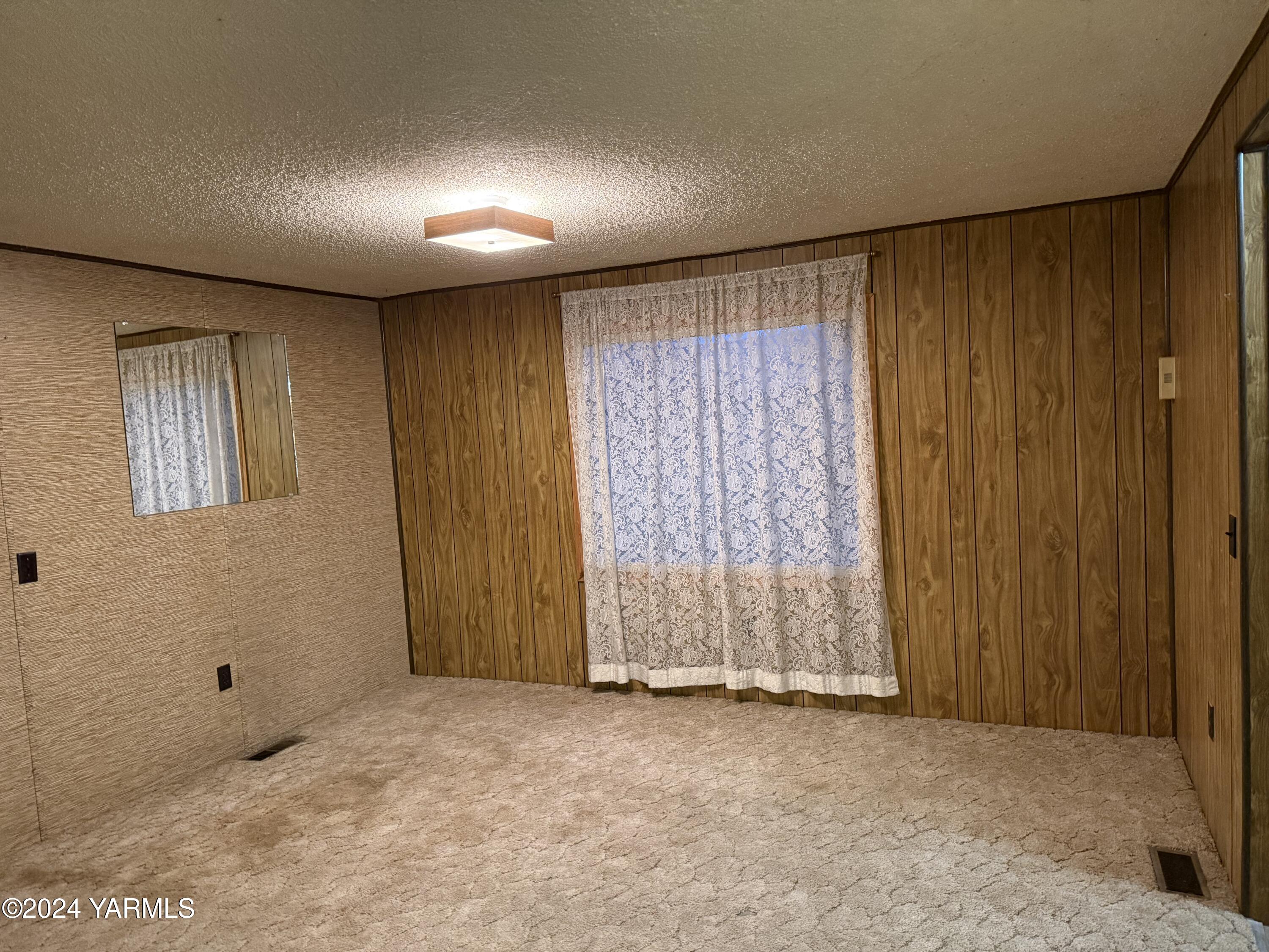 19101 North Beers Road Prosser, WA 99350 - Photo 37 of 45 a view of an empty room with a window