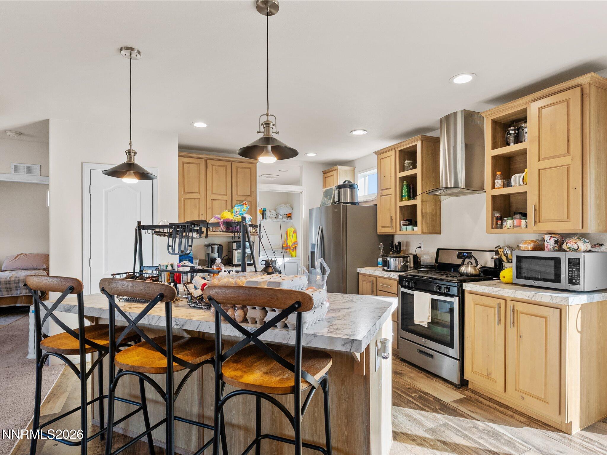4555 Amy Road Reno, NV 89510 - Photo 13 of 74 a view of a dining room with furniture window and wooden floor