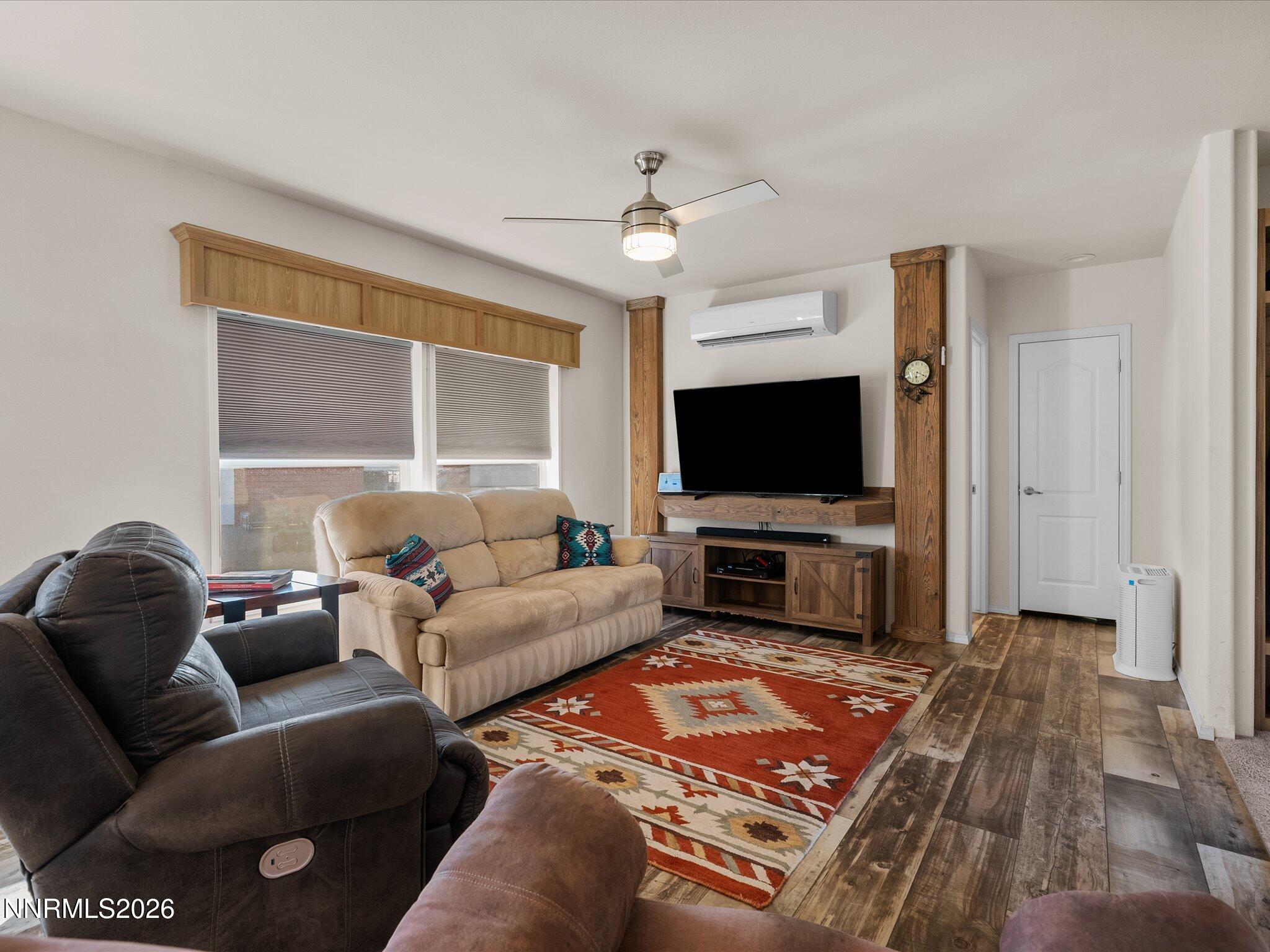 4555 Amy Road Reno, NV 89510 - Photo 18 of 74 a living room with furniture and a flat screen tv