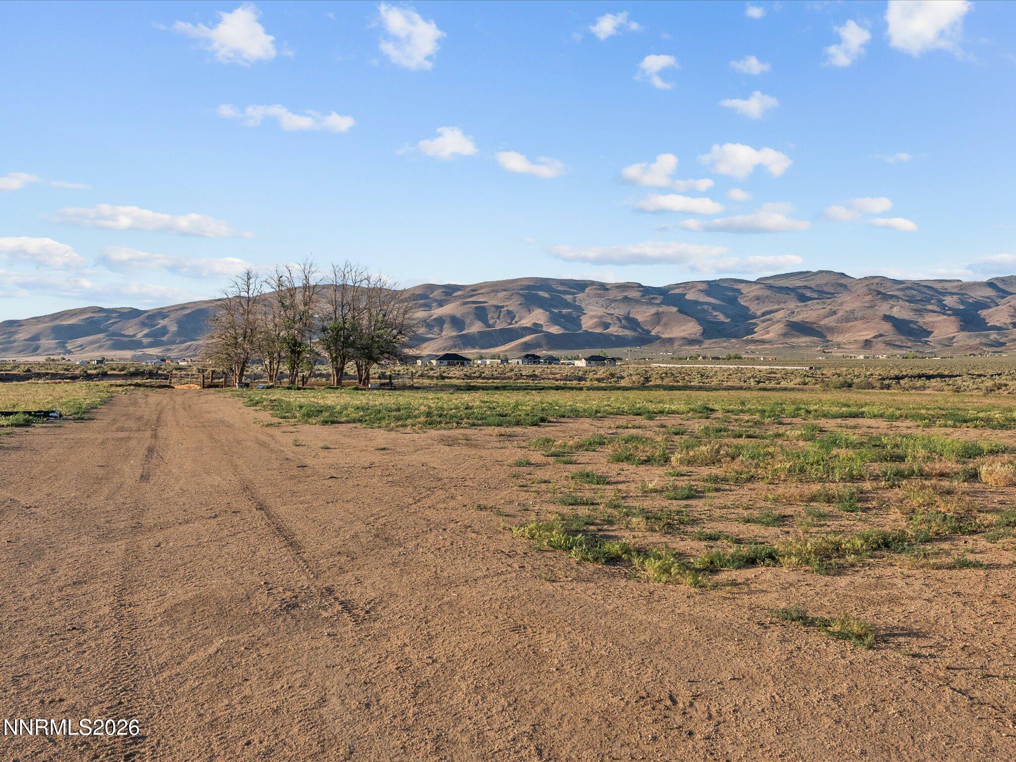 4555 Amy Road Reno, NV 89510 - Photo 46 of 74 a view of a lake with mountains in the background