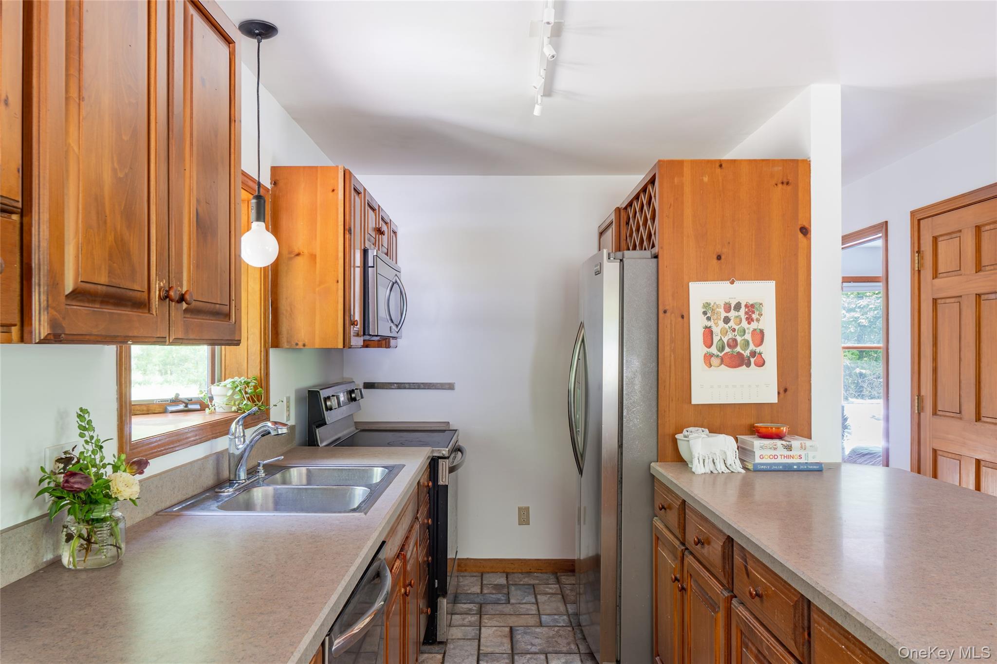 182 Frey Road Pine Bush, NY 12566 - Photo 9 of 33 a kitchen with a sink stove and cabinets