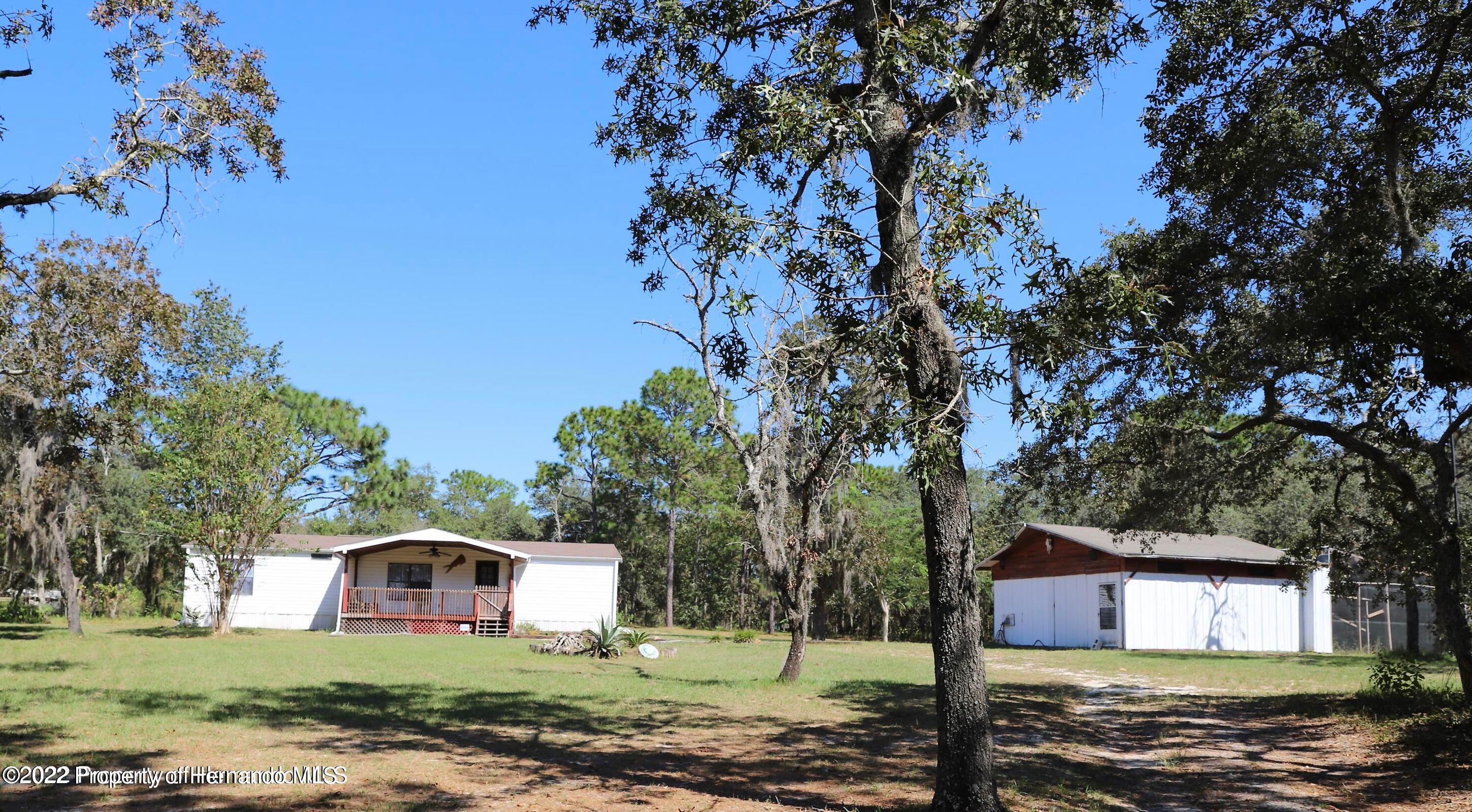 12180 Sunshine Grove Road Brooksville, FL 34614 - Photo 3 of 35 2