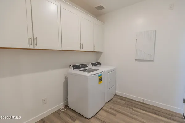 a view of utility room with washer and dryer