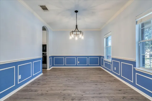 a view of a kitchen with cabinets