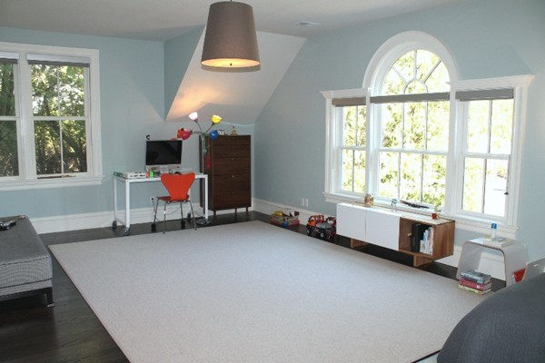 21 Parker Street Lexington, MA 02421 - Photo 22 of 30 a bedroom with furniture and a window