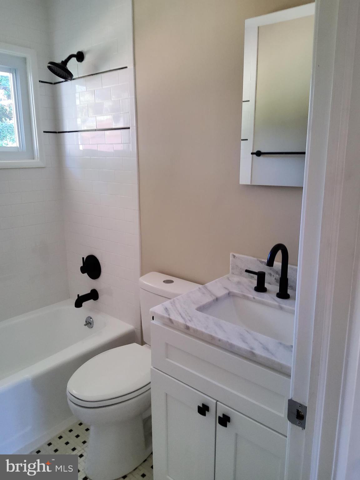 8706 Edgefield Road Baltimore, MD 21234 - Photo 6 of 10 Updated bathroom with a fresh look!