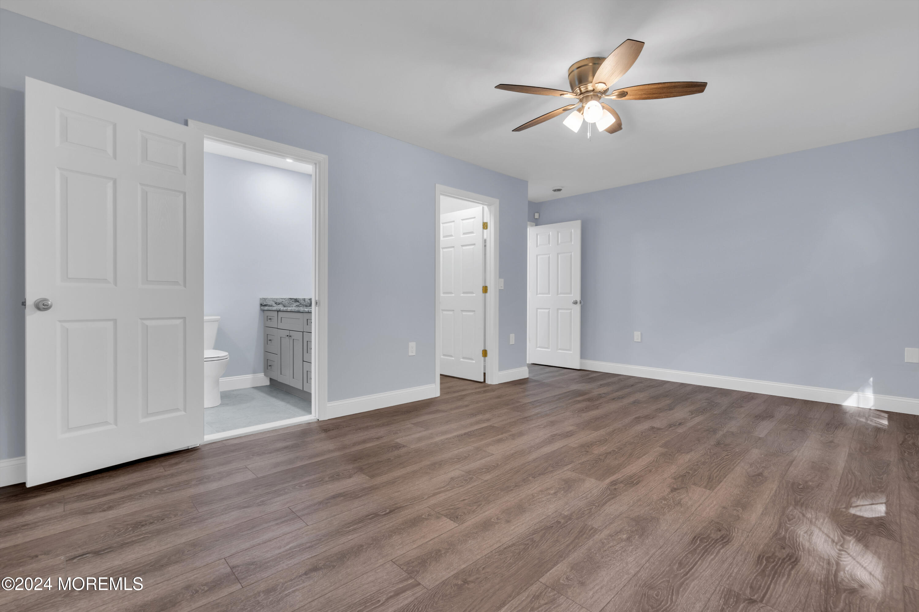 239 Sunset Drive Forked River, NJ 08731 - Photo 23 of 35 a view of an empty room with wooden floor