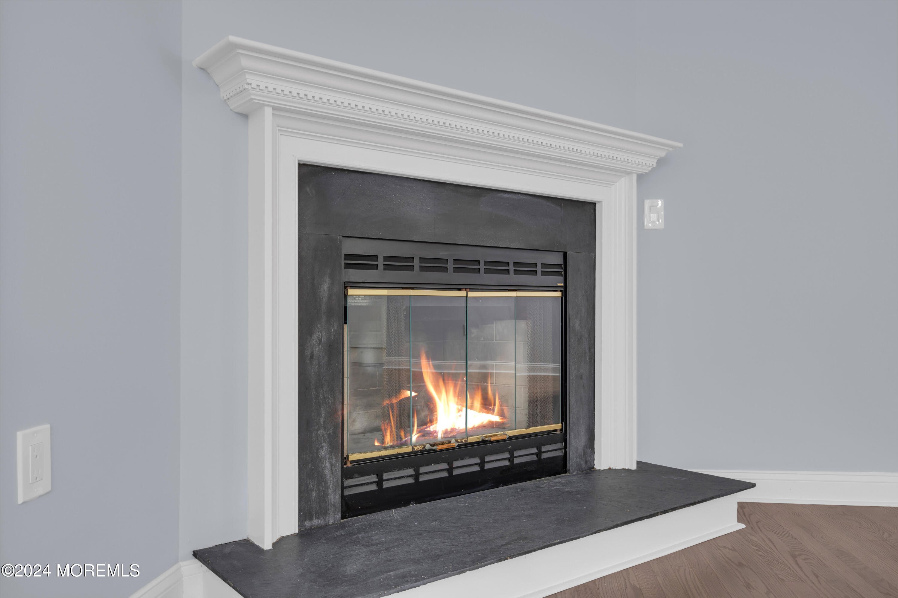 239 Sunset Drive Forked River, NJ 08731 - Photo 9 of 35 a living room with a fireplace