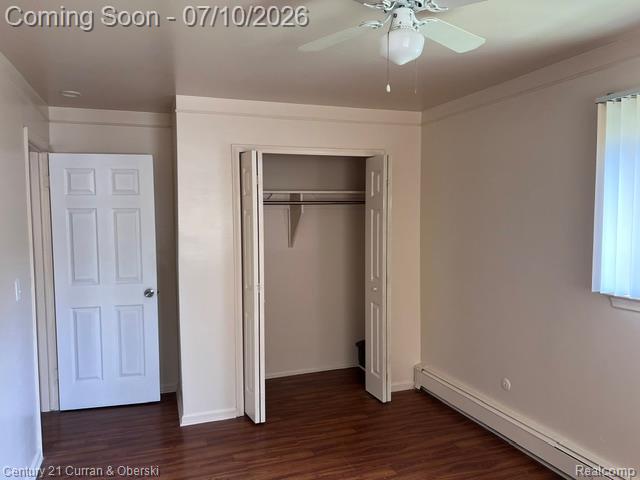 14682 Middle Gibraltar Road, Unit 24 Rockwood, MI 48173 - Photo 11 of 21 Neutral tone walls with crown molding and wood-finish flooring