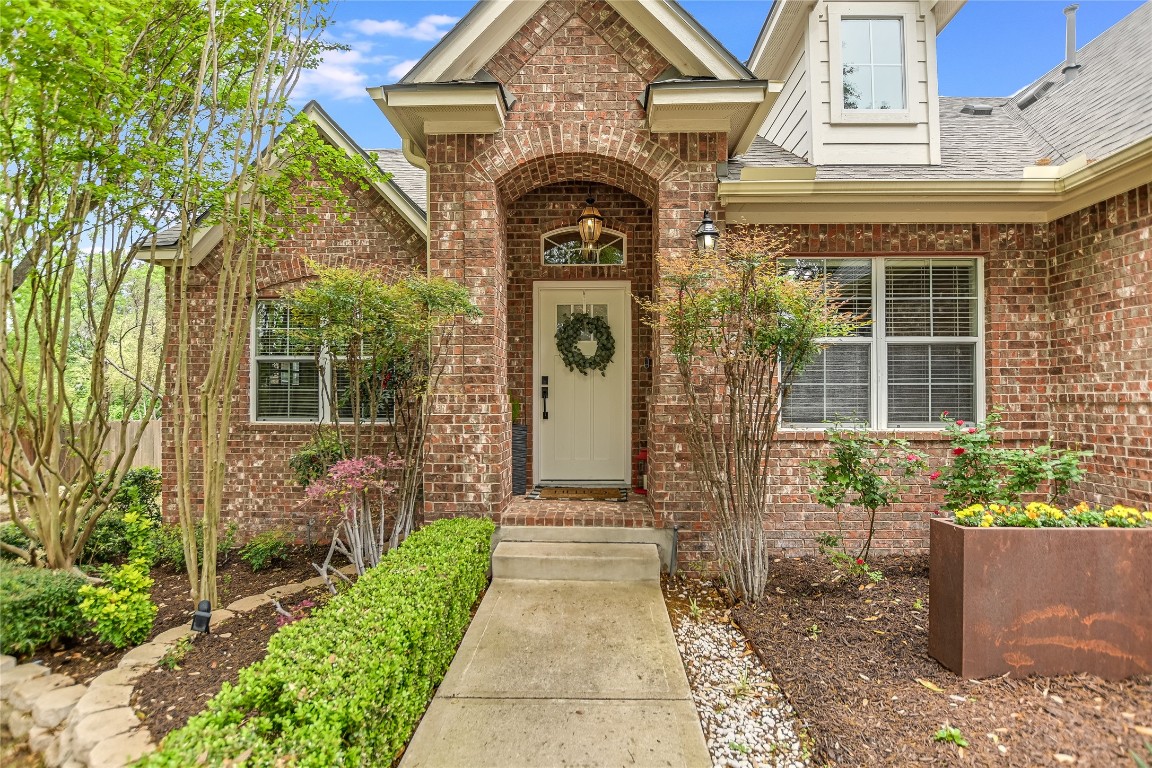 2102 Bindon Drive Cedar Park, TX 78613 - Photo 1 of 1 a front view of a house with a garden