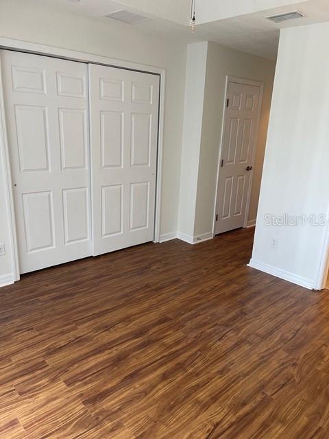 8837 White Sage Loop Lakewood Ranch, FL 34202 - Photo 15 of 22 a view of empty room with wooden floor