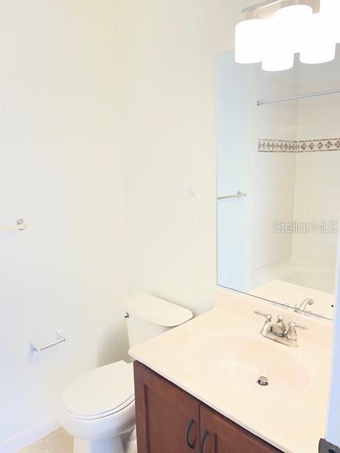 8837 White Sage Loop Lakewood Ranch, FL 34202 - Photo 17 of 22 a bathroom with a sink a toilet and shower