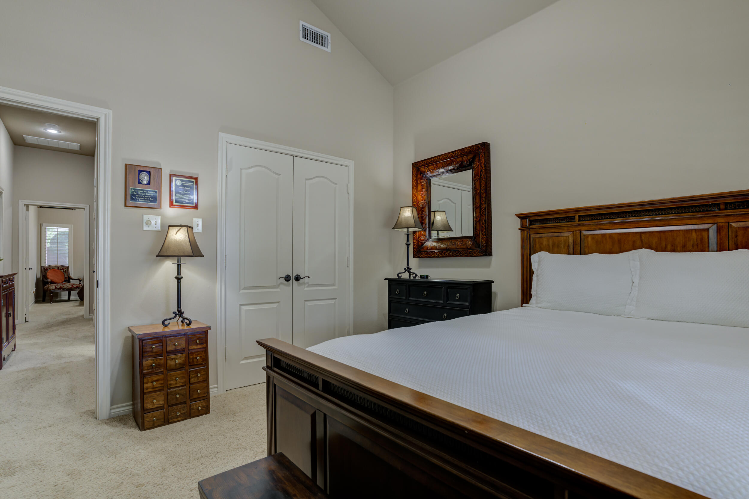 6008 89th Street Lubbock, TX 79424 - Photo 48 of 61 a bedroom with a bed and a dresser