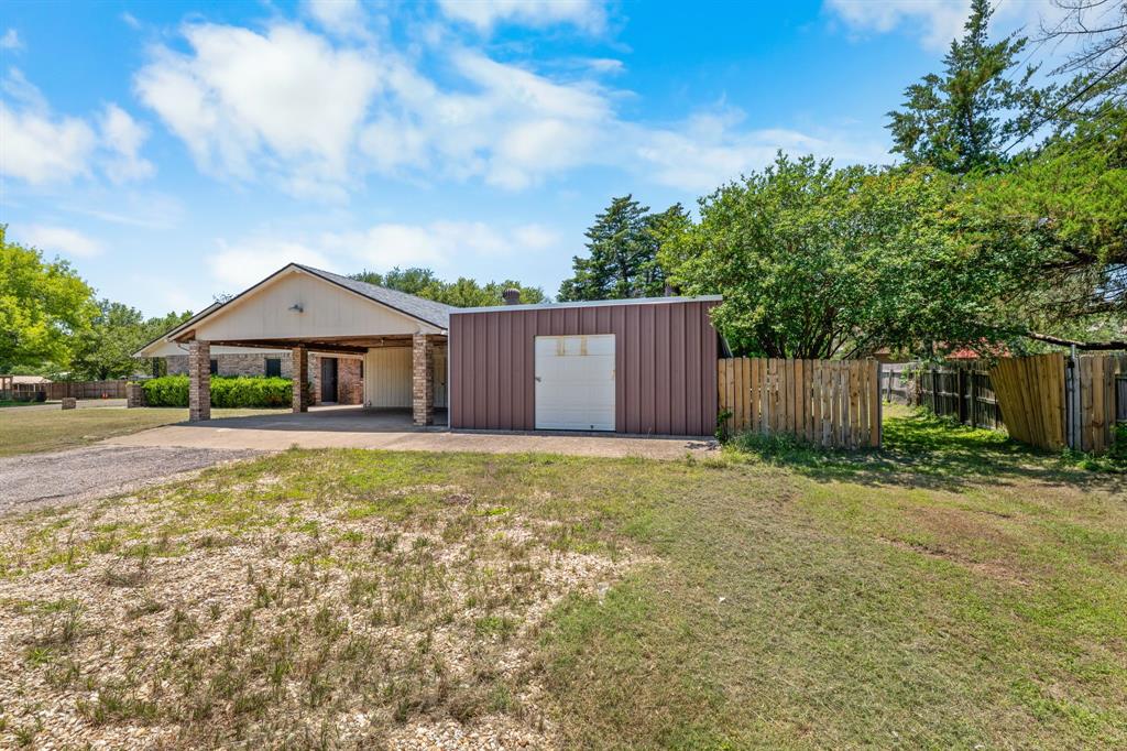 373 Ingred Street Waco, TX 76705 - Photo 25 of 39 a front view of a house with garden
