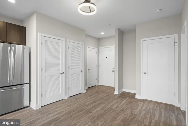a view of a livingroom with wooden floor