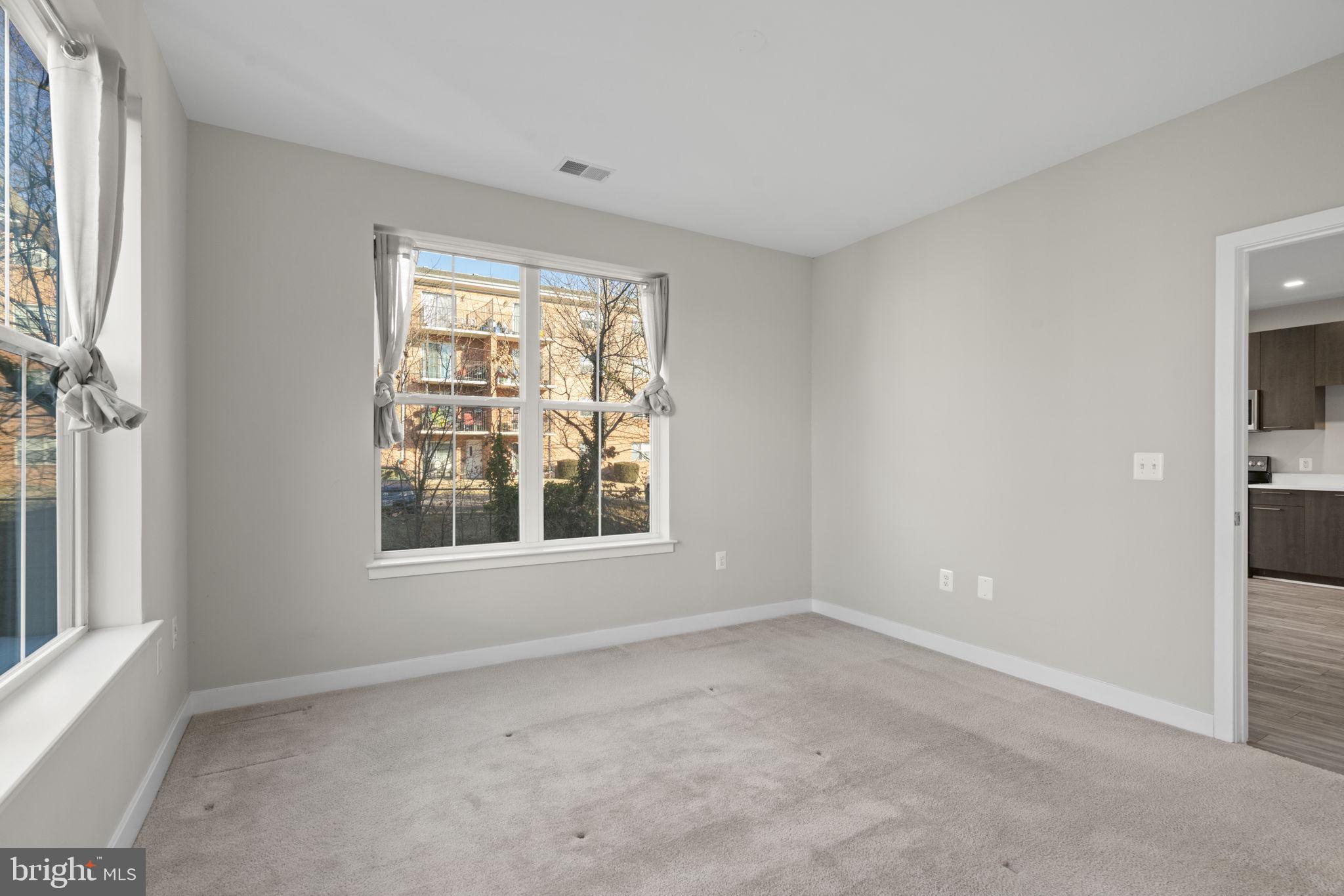 989 South Buchanan Street, Unit 312 Arlington, VA 22204 - Photo 27 of 45 an empty room with a window