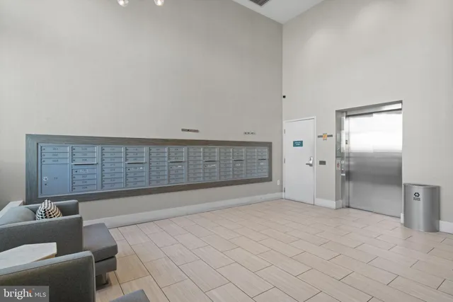 a view of an empty room with a fireplace