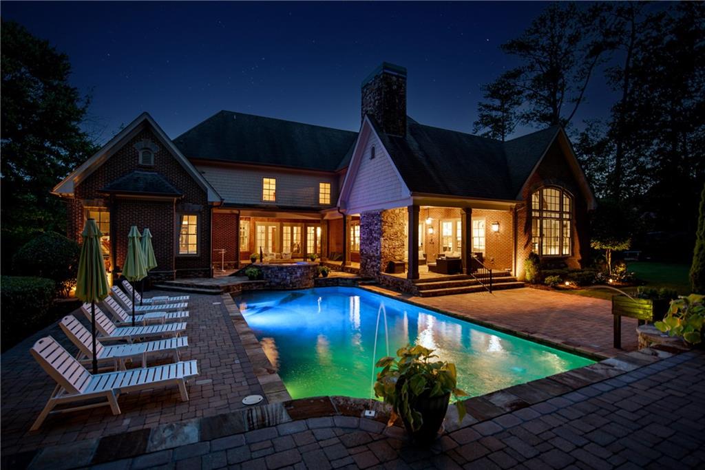 13942 Tree Loft Road Milton, GA 30004 - Photo 7 of 102 a view of swimming pool with seating area and furniture
