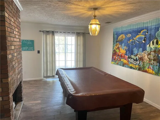 a room with a table and chairs