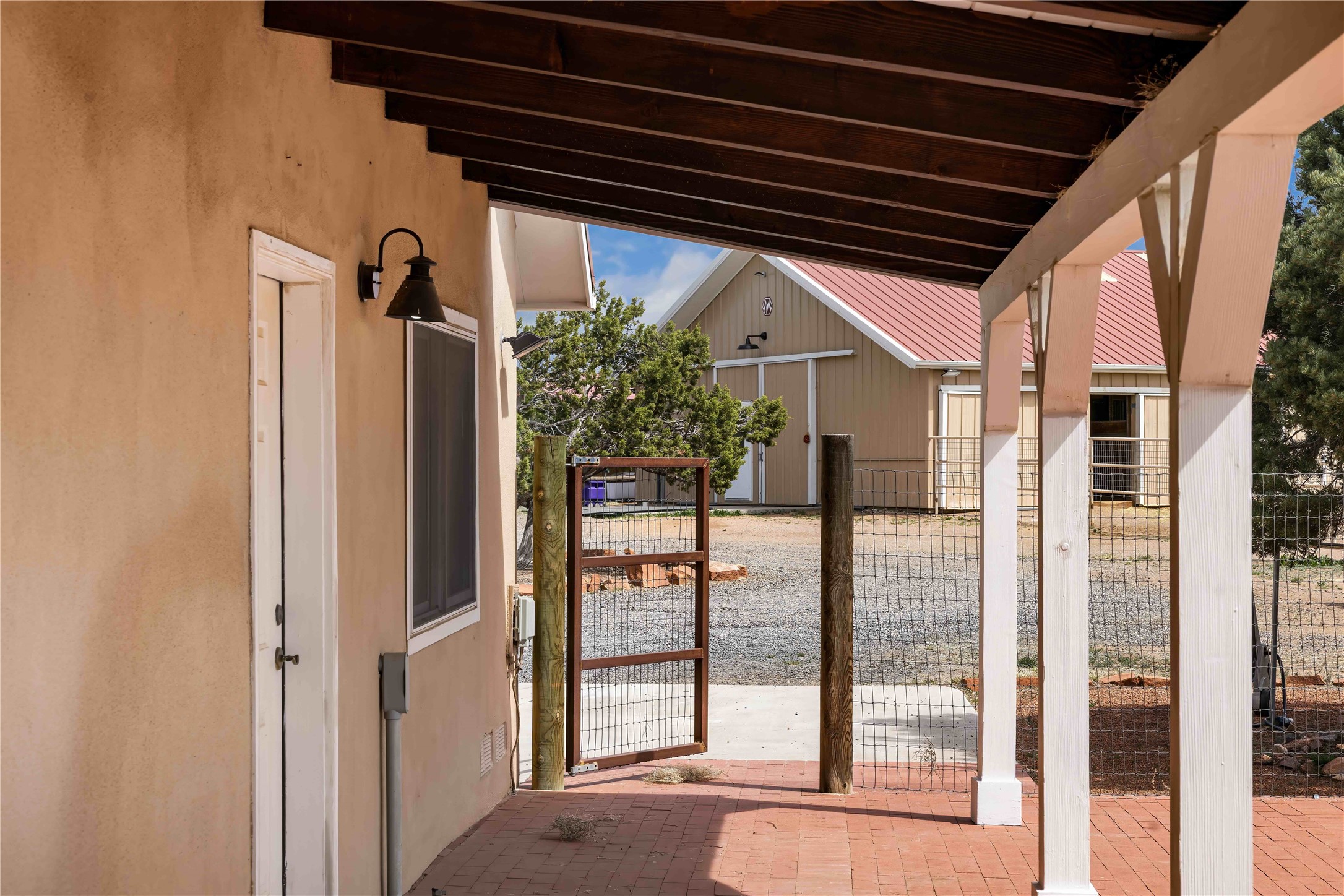 133 Jacinto Road Santa Fe, NM 87508 - Photo 27 of 46 Side yard with garage entrance