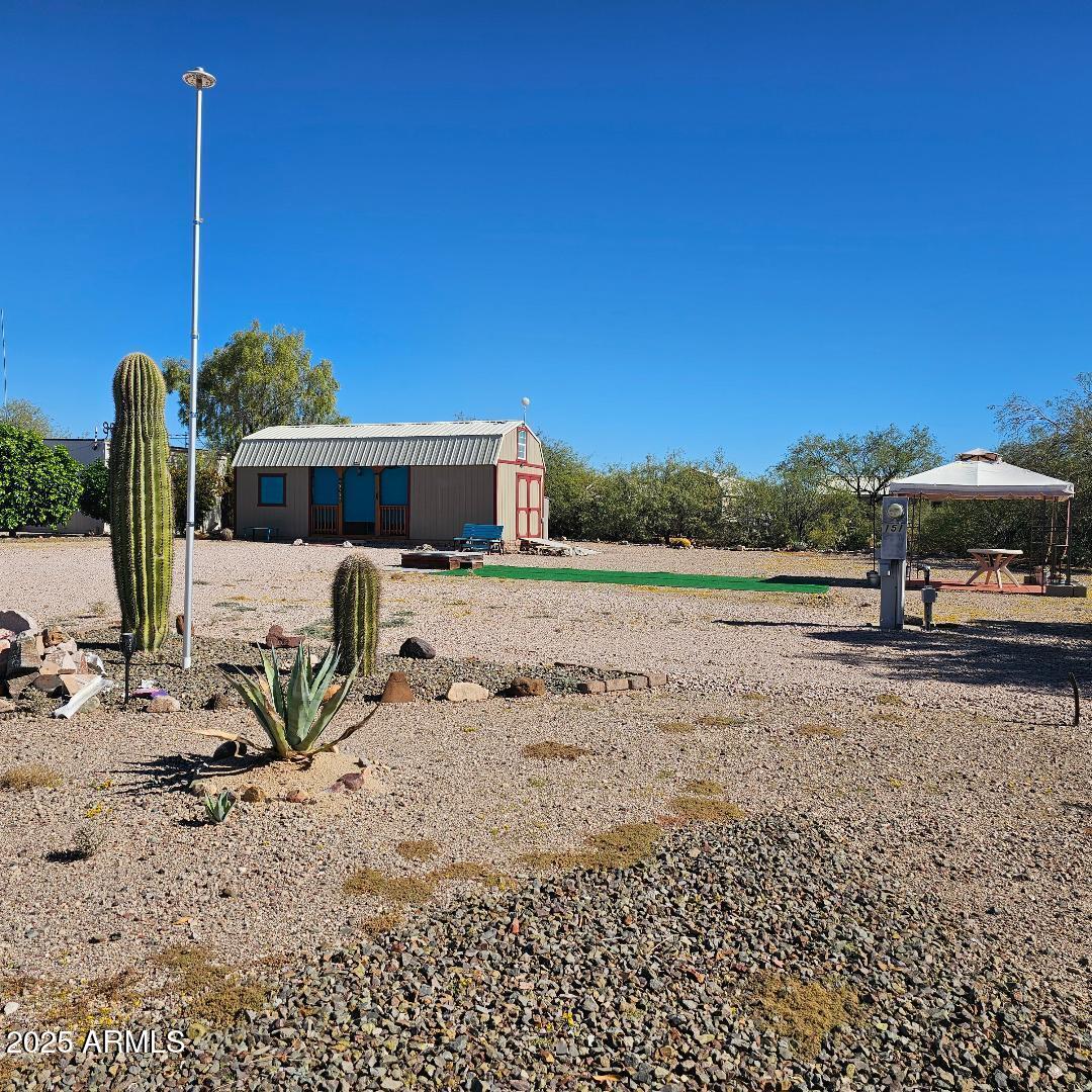 30605 Meandering Lane, Unit 151 Congress, AZ 85332 - Photo 3 of 18 a view of a terrace with chairs