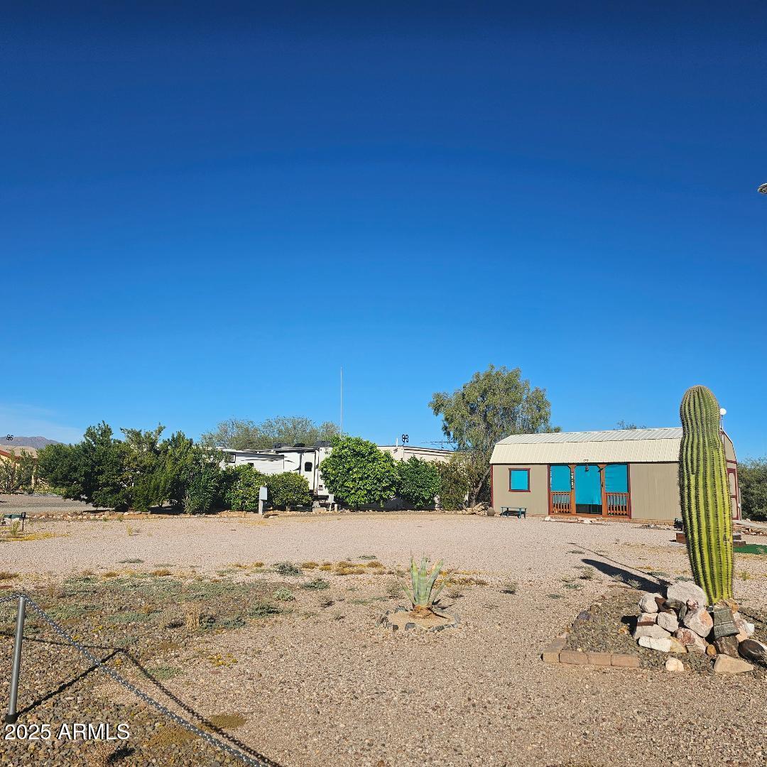 30605 Meandering Lane, Unit 151 Congress, AZ 85332 - Photo 4 of 18 a view of houses with sky view