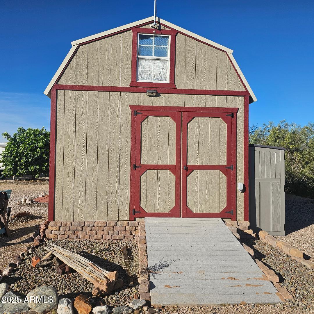 30605 Meandering Lane, Unit 151 Congress, AZ 85332 - Photo 7 of 18 a front view of a house