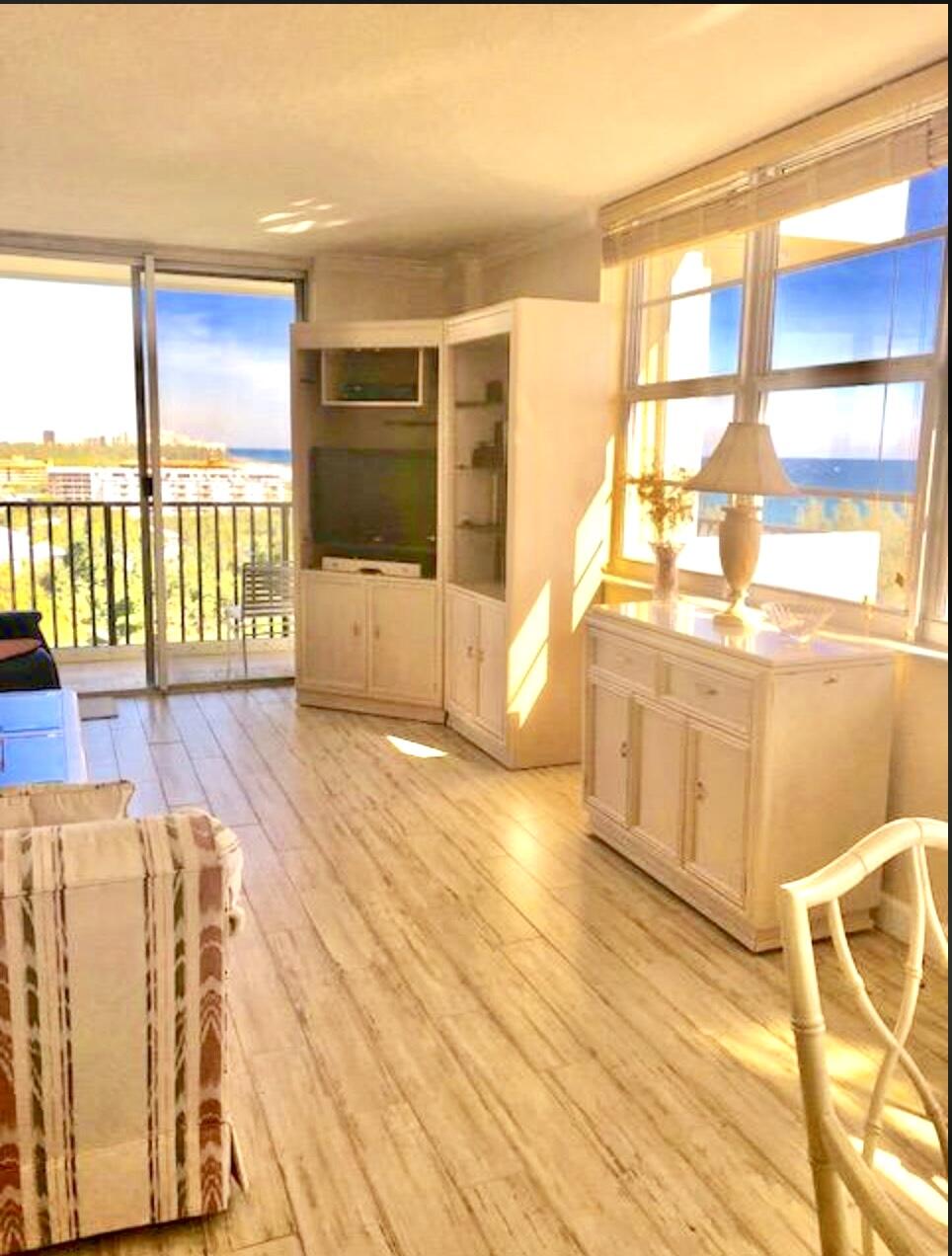2121 North Ocean Boulevard, Unit 1208E Boca Raton, FL 33431 - Photo 15 of 61 a view of a living room with a large window