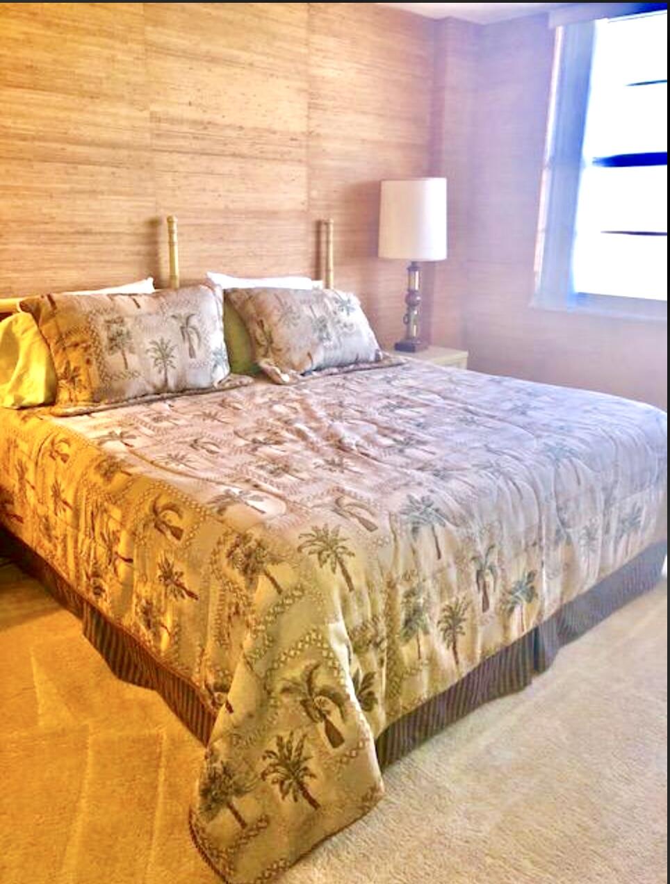 2121 North Ocean Boulevard, Unit 1208E Boca Raton, FL 33431 - Photo 17 of 61 a bedroom with a bed and a window