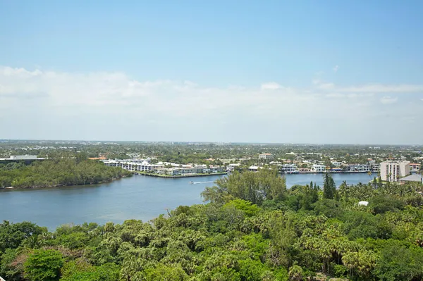 an aerial view of residential building and lake view
