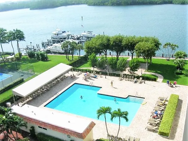 a view of a lake with outdoor seating