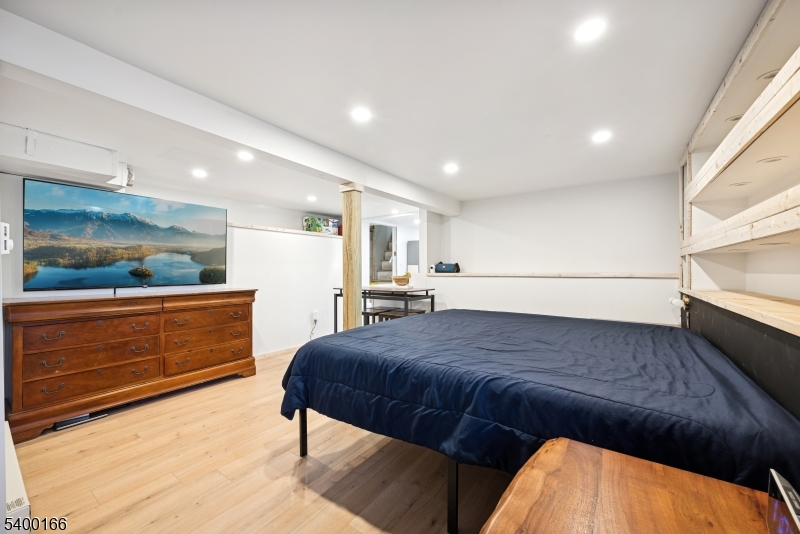 206 Brooklyn Mountain Road Hopatcong, NJ 07843 - Photo 13 of 18 a bedroom with a bed and a dresser